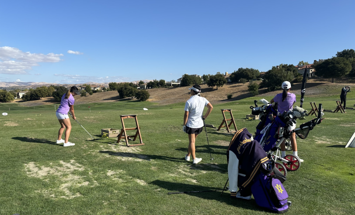 Team Captain Jessica Chen watches her teammate, giving any advice she can to improve the team. 